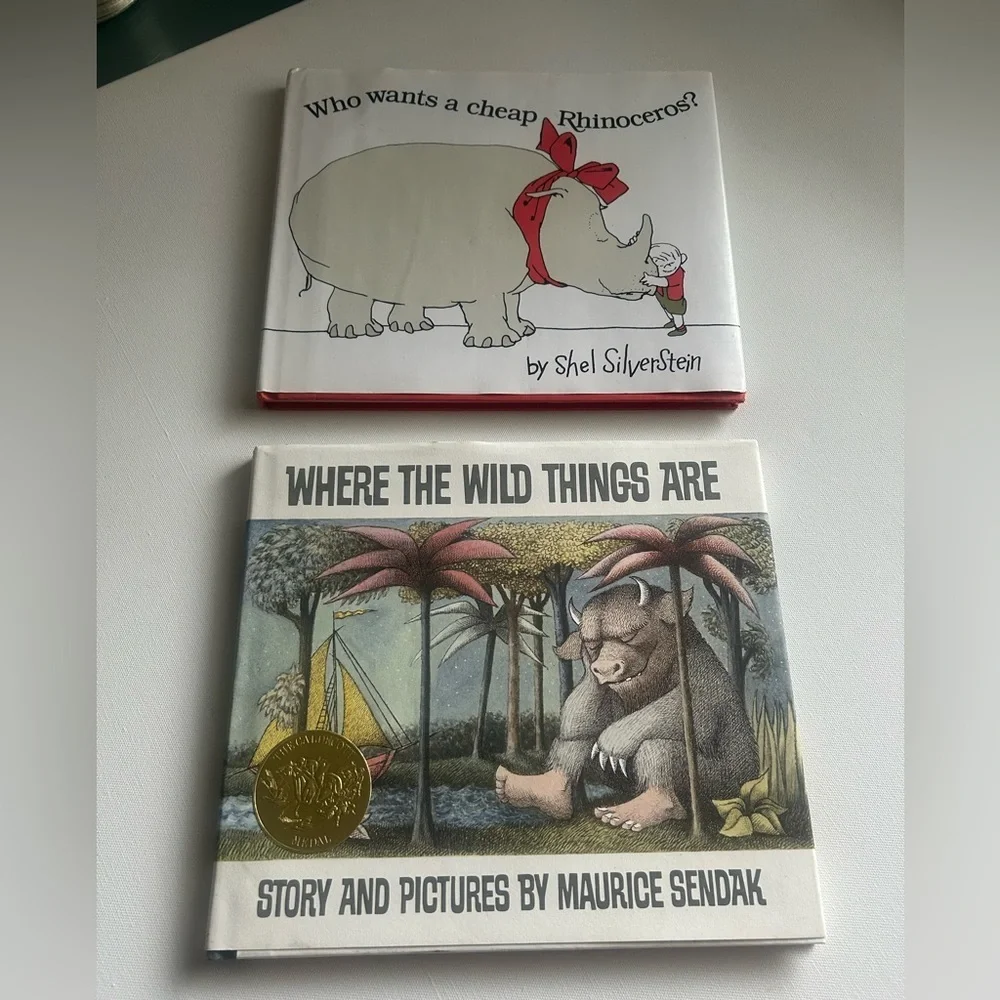 Set of 2 Where the Wild things Are Book & Who wants a cheap rhinoceros Hardback